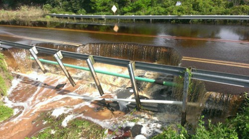 This photo shows water running from the north side over 30A in the area of Big Red Fish Lake on Aug. 18. Photo courtesy Walton County Sheriff's Office.