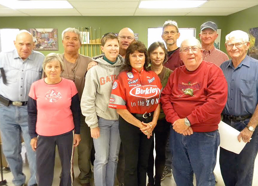Professional lady angler Carolyn Poole (center) was the featured speaker at the Senior Fishing Club meeting. Photo courtesy J.B. Hillard