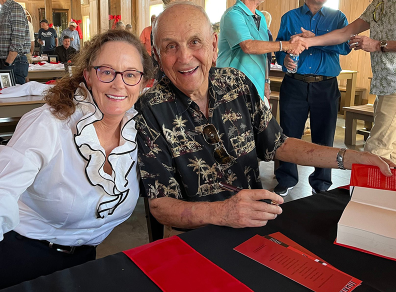Kathryn J. Hardy and Dr. Johnny Savage at recent book signing. Lori Ceier/Walton Outdoors